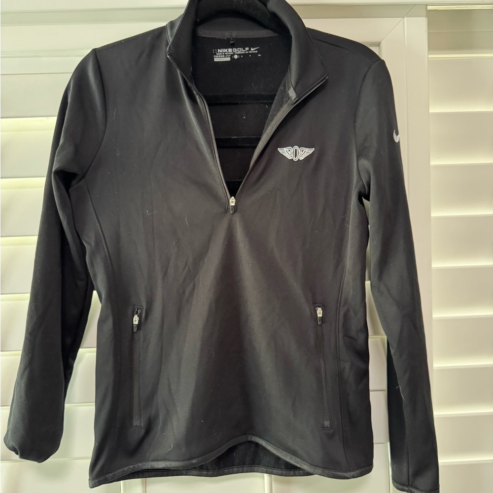 Women's Nike Black Quarter-Zip Pullover fleece lined golf and utility pullover.